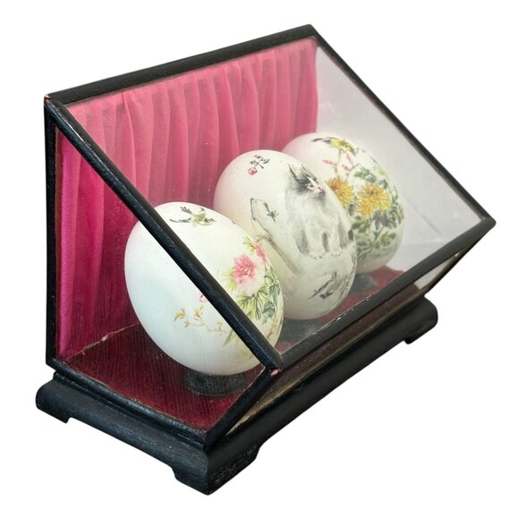 Hand-Painted Decorative Eggs In Glass Display Case With Pink Velvet Backdrop - Picture 3 of 4